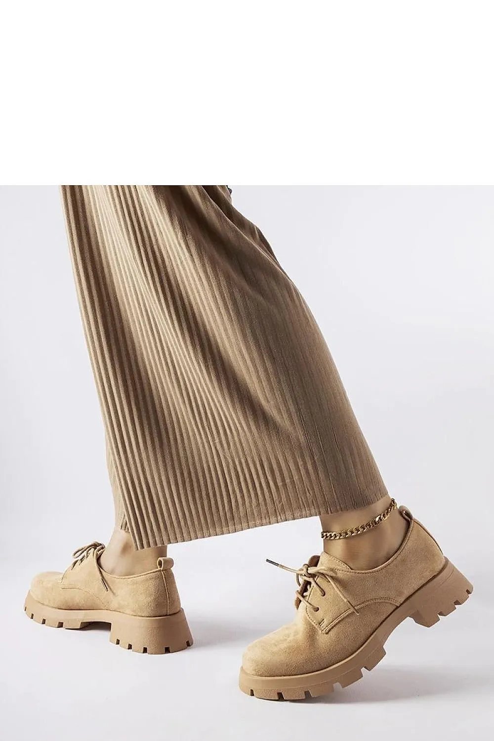 Beige half boots on a solid Coleman sole