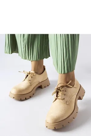 Beige half boots on a solid Coleman sole